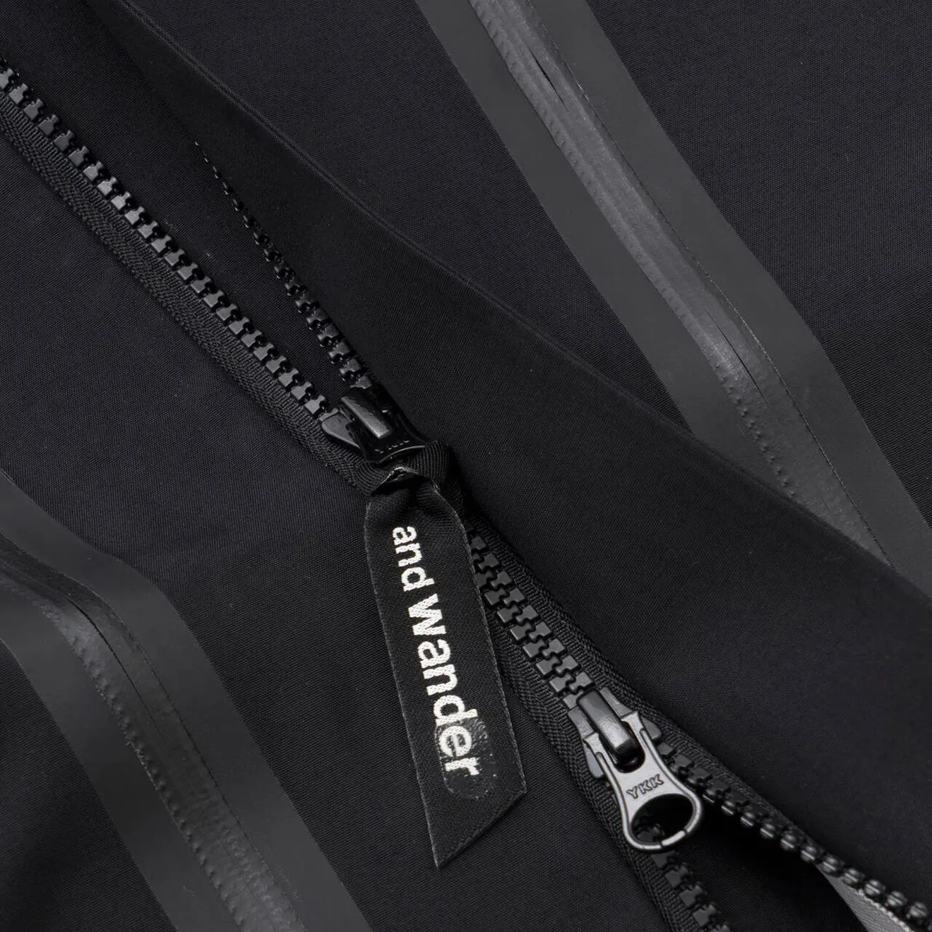 And Wander 2.5L Hiker Rain Jacket Black